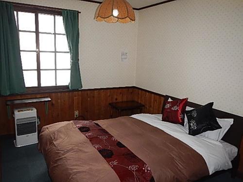 Mt Hakuba Backpackers Hostel Екстер'єр фото